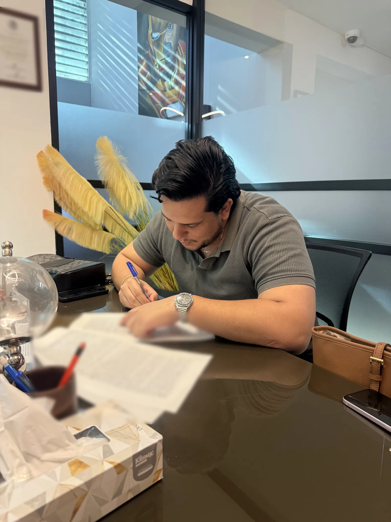 A client signs for his purchase