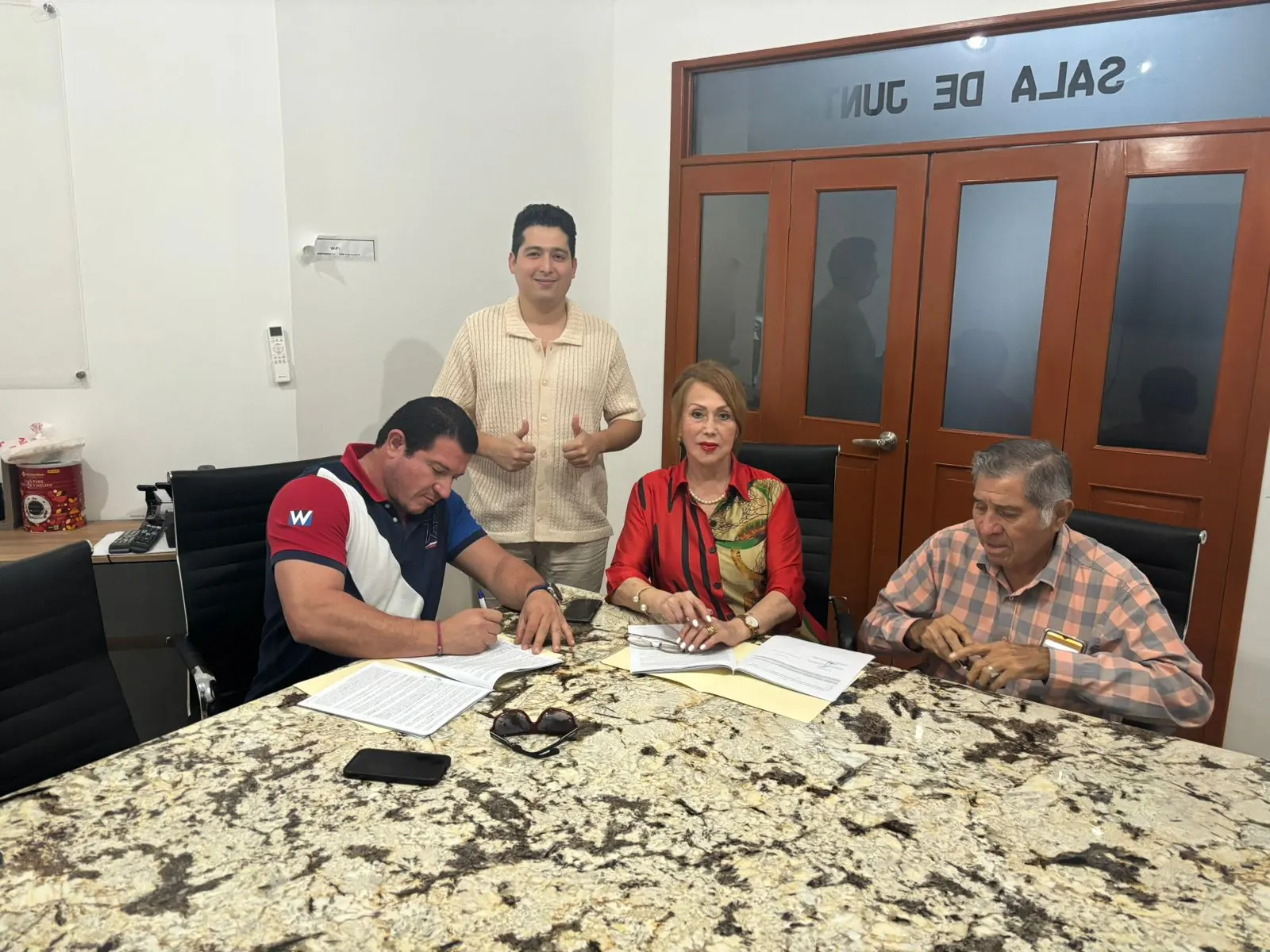 Signing in the meeting room